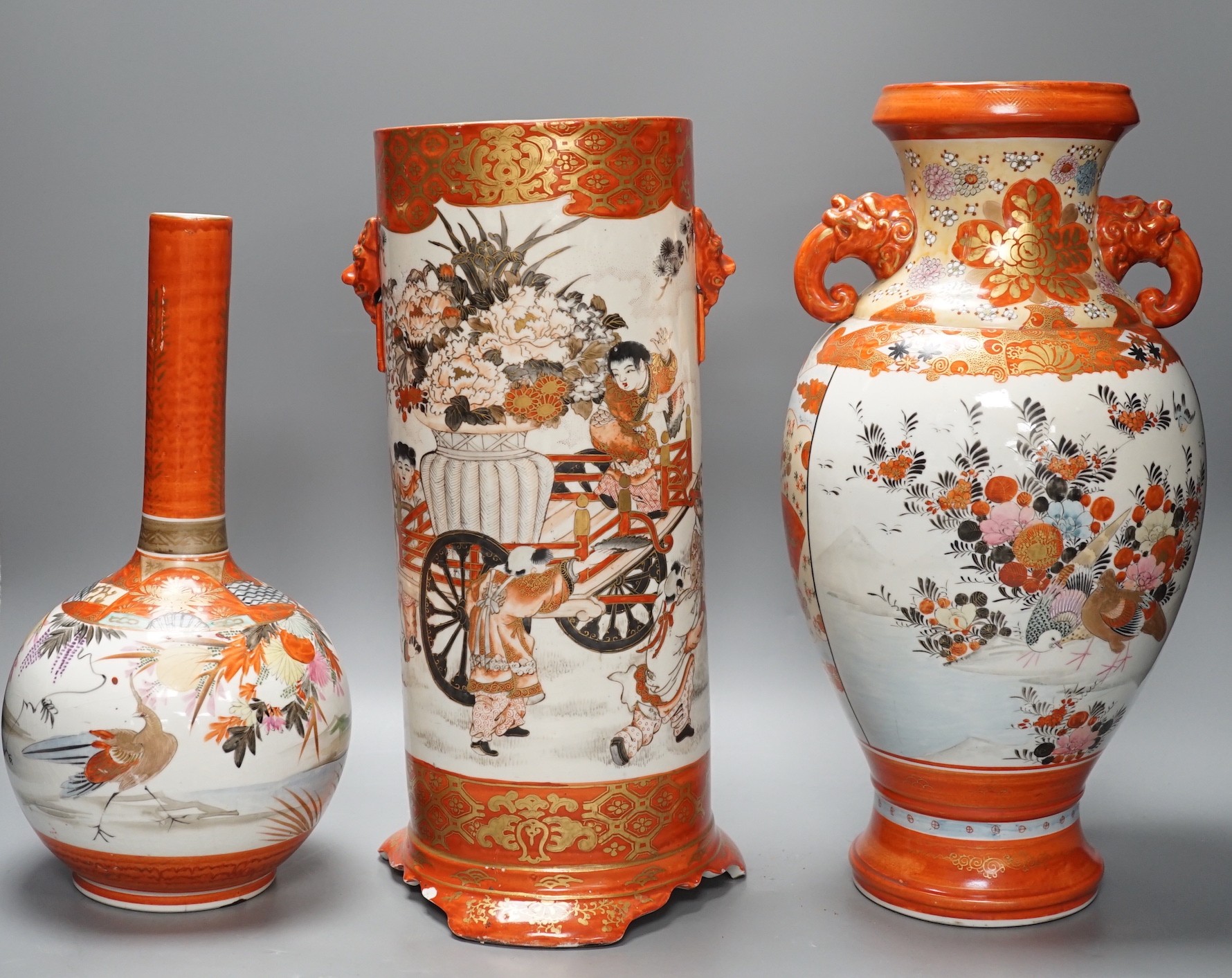 A large Japanese Kutani sleeve vase, bottle vase and another, sleeve vase 34.5 cms high